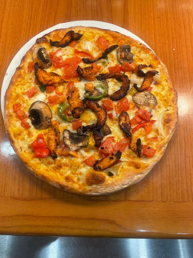 LargeTandoori Chicken Pizza.